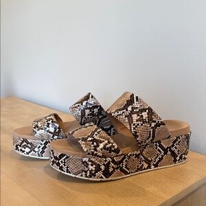 J Slides Snake-Print Platform Mules in Beige and Black